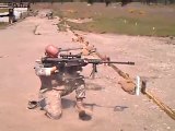 50 cal Barrett sniper rifle fired while kneeling