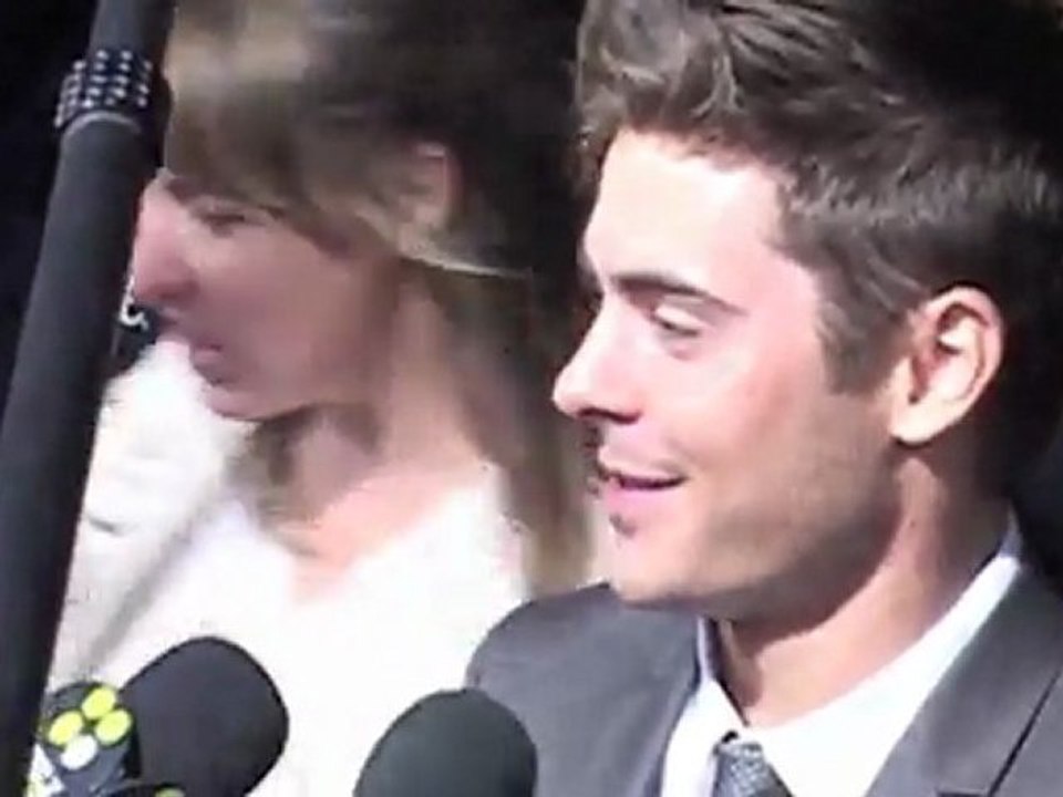 Ashton Kutcher and Lea Michele Cuddle on 'New Years Eve' Carpet