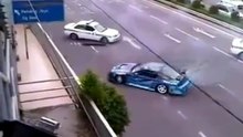 Awesome Car Chase! Dude in Sports Car Drifts away from Russian Police