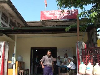 Suu Kyi's image returns to media amid Myanmar changes