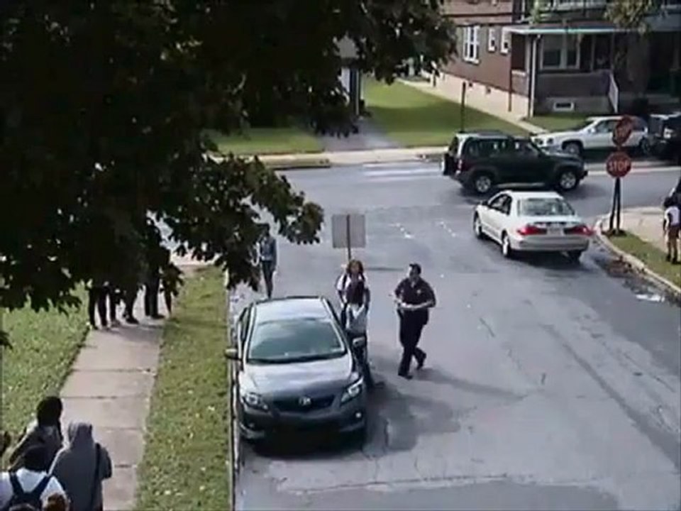 Policeman gives electric shock to student