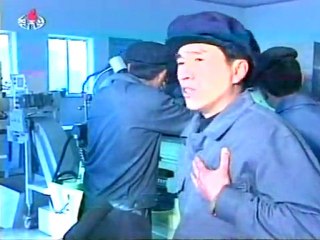 North Koreans mourn their late leader at work