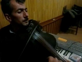 nallıhanlı kemancı elvan elvan bilsen uzaklarda