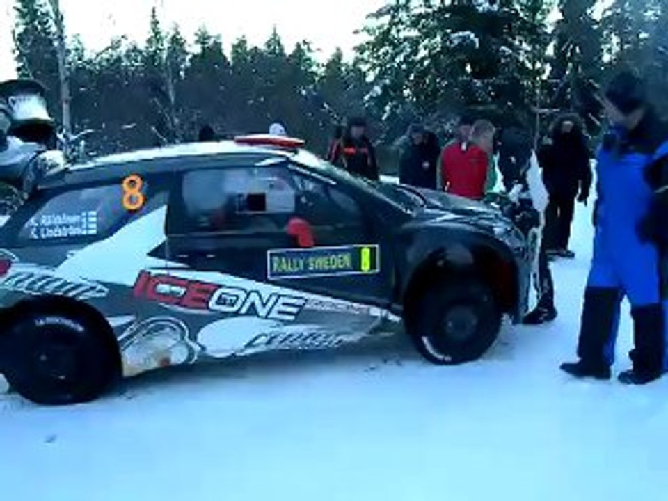 WRC Rally Sweden 2011 Kimi Räikkönen and Kaj Lindström changing tyres