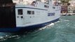 Capri Napoli ferry karge ship maneuvering  at the port