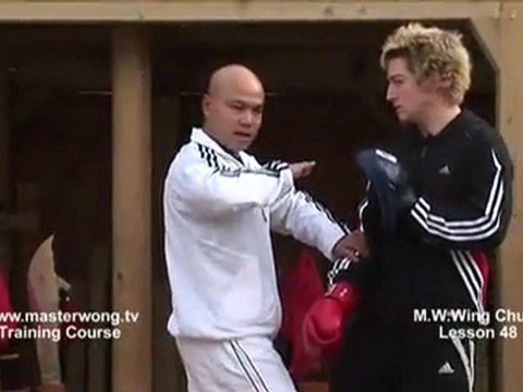 How to do Wing Chun Lesson 48- Block, cover and Elbow to the chest (Pad work)