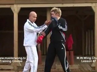 How to do Wing Chun Lesson 47-Block, cover and Chop to the neck (Pad Work)