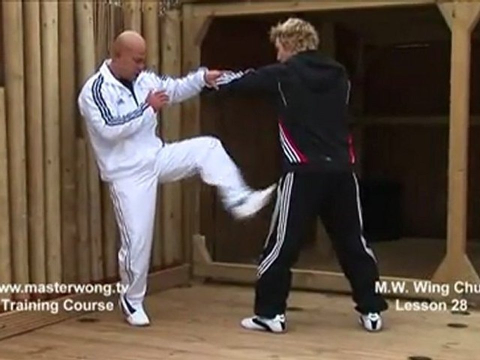 How to do Wing Chun Lesson 28- combo_ blocking straight punch and countering with a stomp kick