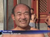 Beijing's frozen lakes attract China's bravest swimmers