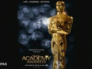 Lautner gay cover fake; Adele tops sales