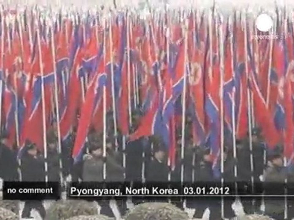 North Koreans rally in show of support for... - no comment