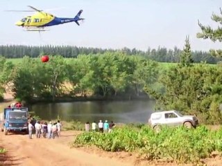 Chile brings fires under control as probe expands