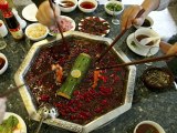 Chinese Billionaire Dies from Eating Poisoned Cat Meat Hotpot