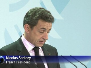 Merkel, Sarkozy vow faster euro action as crisis bites