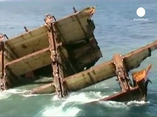 Stern of stricken NZ ship sinking into the sea