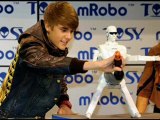 Justin Bieber Brings Back the Bieber 'Do, Unveils Robot at CES Show (VIDEO)