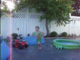 My grandkids in their first pool.