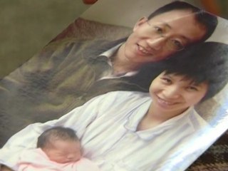 Police Raid Hu Jia's Home, Warn Against Activism