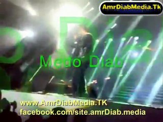 ‫عمرو دياب يداعب جمهوره والحفلة الجاية بدون جمهور بسبب الشماريخ فى حفل مهرجان الايمان 2 كيو نت‬