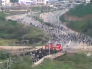 قمع المتظاهرين بالماء في مظاهرة درعا 18 آذار 2011