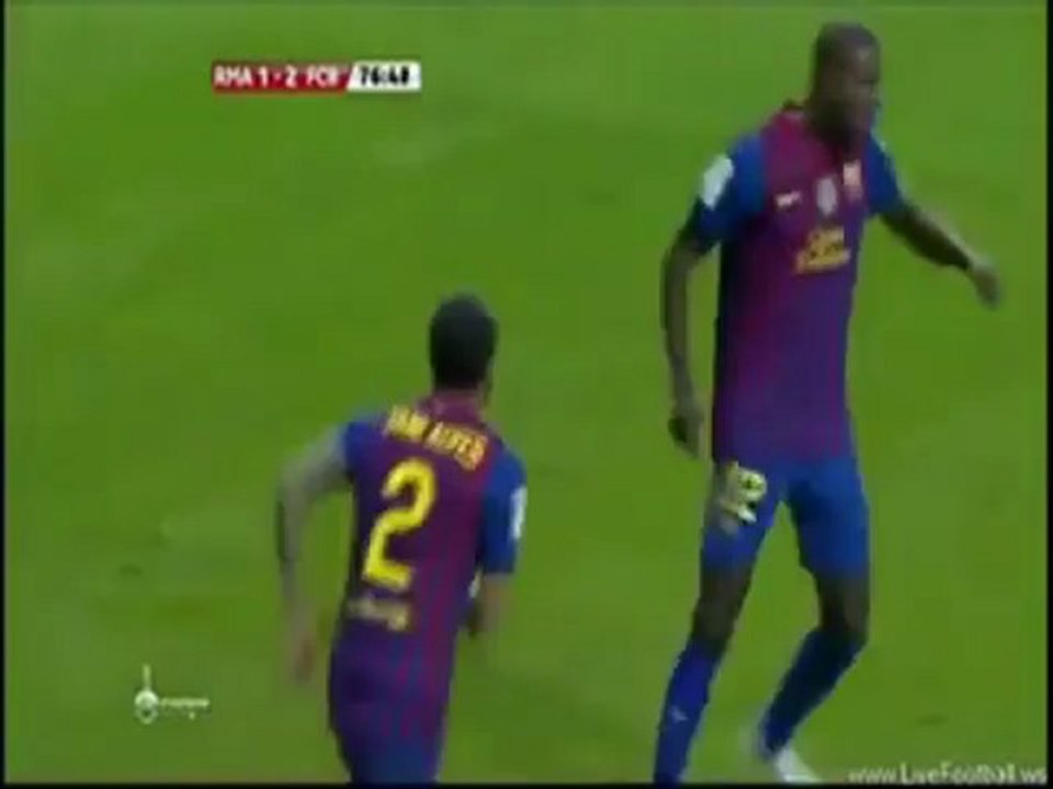 Eric Abidal and Dani Alves dance