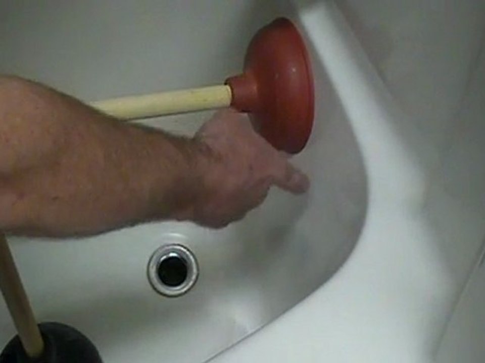 How to unplug a bathtub drain.
