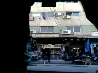 فري برس   ريف دمشق دوما اقتحام عصابات الاسد القمعية للسوق التجاري 15 10 2011