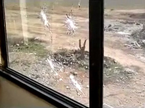 فري برس حمص القصير حاجز لقوات الإحتلال وآثار استهدافه للبيوت القريبة 12 12 2011