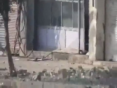فري برس حمص ديربعلبة آثار القصف على المحلات 22 12 2011
