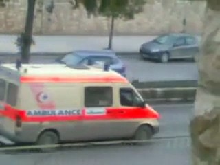 فري برس   حلب   مرور موكب شبيحة مسلحين أمام المشفى الجامعي 12 01 2012