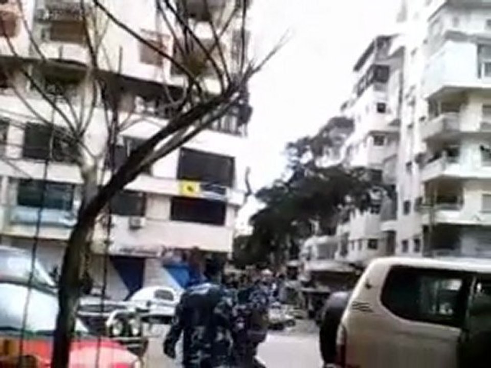 فري برس   اللاذقية شارع بور سعيد قطعان الأمن و الشبيحة تريد إعتقال طفل لا يزيد عمره عن 12 عام 13 1 2012