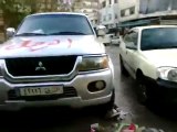 فري برس   اللاذقية   الرجل البخاخ يخط ارحل على سيارة الأمن 16 1 2012
