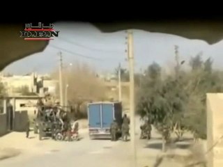 فري برس   عصابات الأسد تنهب مدينة القورية 18 1 2012