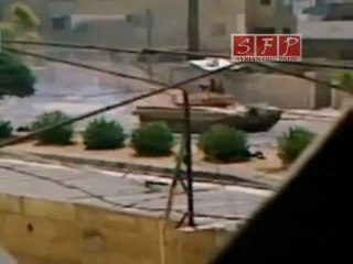 حماة دبابه تقتحم منطقة الاربعين وتحاول فك الحواجز 13 7 2011