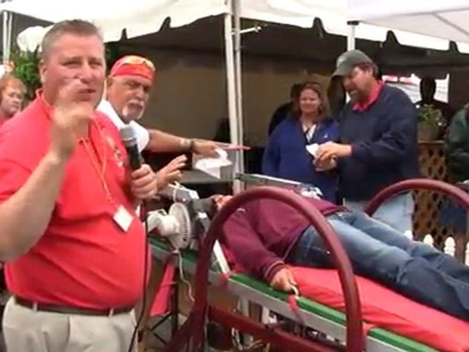 Dr. Love inserts a Strawberry with Kahlua in it Memphis in May