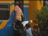 Stone balls to knock passengers off Indonesian train roofs