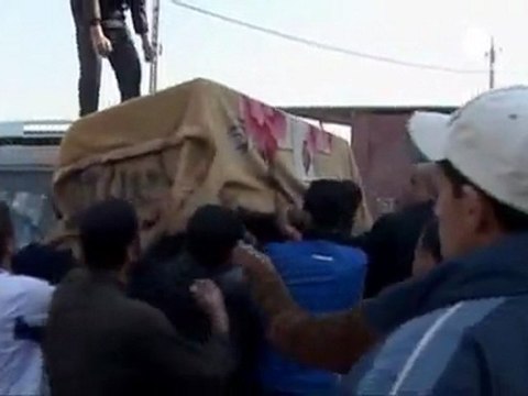 Suicide bomber kills dozens at Iraqi funeral
