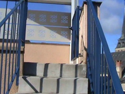 Terrasse bois composite et pergola alu sur un toit