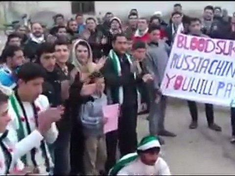 فري برس حماة كفرزيتا حرق العلم الروسي وصور الخائن بشار 29 1 2012