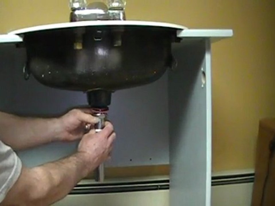 How to install a plug and chain P.O. plug in a bathroom basin/sink.