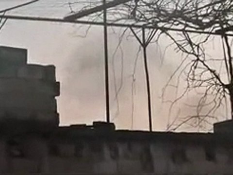 فري برس حمص الحولة الدخان المتصاعد من أحد المنازل بعد قصفه 5 2 2012