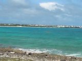 Anguilla's Cove Bay beach and a view of French St. Martin