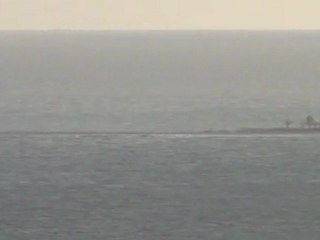 Anguilla's Crocus Bay and a view of Sandy Island