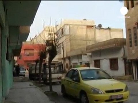 Tanks and soldiers on the streets of Homs