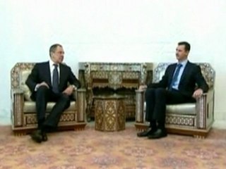 Russia calls for talks as battles in Syria rage