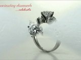 Round Cut Diamond Engagement Ring With Round Side Stones In Pave Setting
