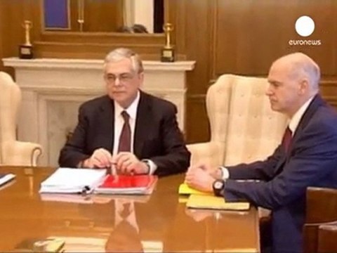 Greek debt deal sparks protests and a strike