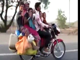 Family Crams Onto Motorcycle