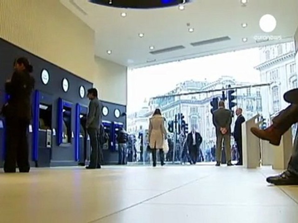 Barclays cuts bonuses but still faces protests