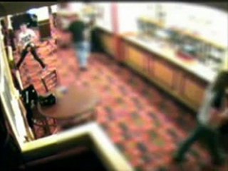 Caught On CCTV: Crazy Dude Goes Chainsaw Massacre Into The Pub And Gets Knocked Out!